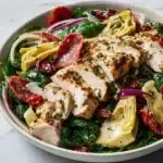 Italian Salad with Chicken, Spinach, Artichokes, Salami, Sun-Dried Tomatoes, and Red Onions Recipe